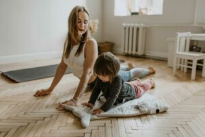 woman and girl yoga scaled 2