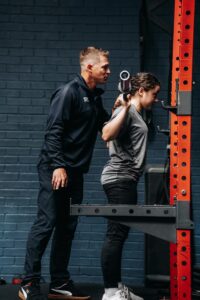 A physiotherapist working on a rehabilitation plan in a gym in Stanway, Colchester