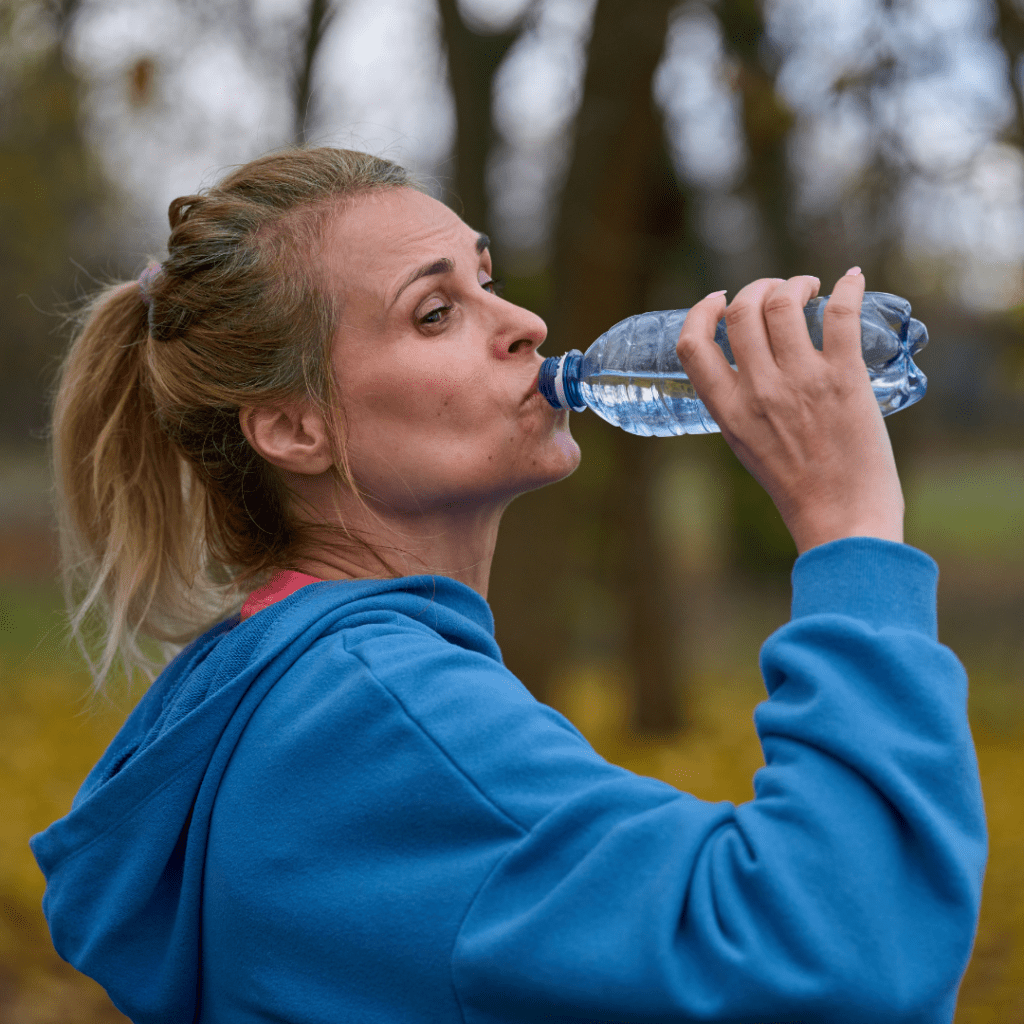 Runner hydrating after Colchester Half Marathon